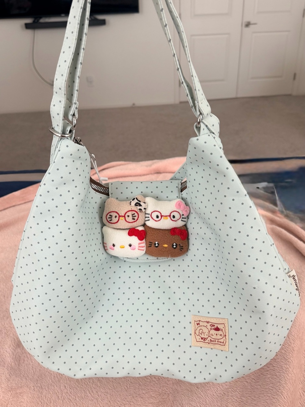 Light Mint Polka Dot Shoulder Bag with Cute HK Heads Plush Charm